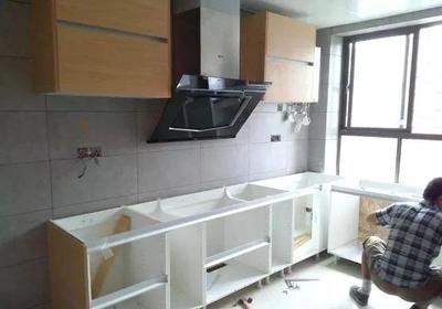 先安抽油烟机还是橱柜